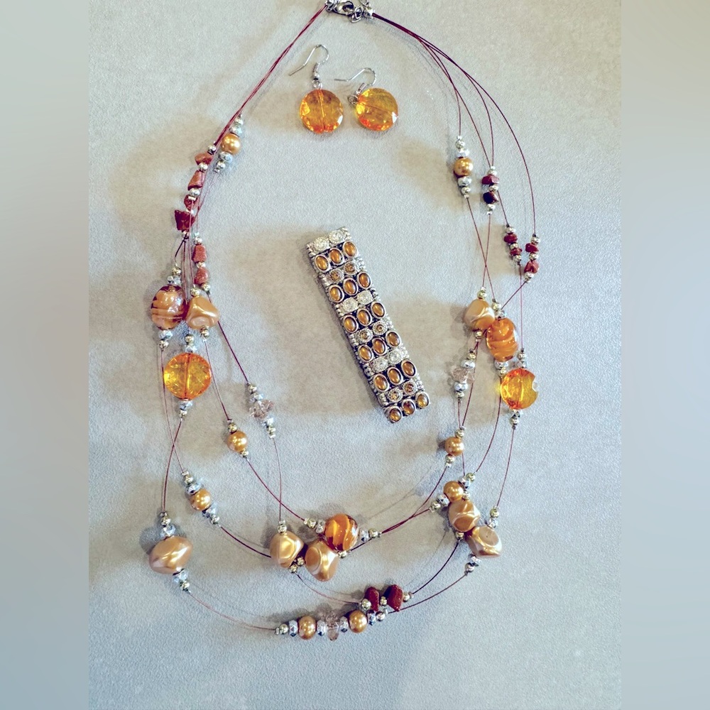 Orange beaded necklace and earring set with stretch orange bracelet